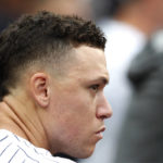 
              New York Yankees center fielder Aaron Judge looks out of the dugout during the second inning a baseball game against the Tampa Bay Rays on Sunday, Sept. 11, 2022, in New York. (AP Photo/Noah K. Murray)
            