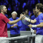 
              Team World's Jack Sock, left, shakes hands with Team Europe's Casper Ruud after a match on day one of the Laver Cup tennis tournament at the O2 in London, Friday, Sept. 23, 2022. (AP Photo/Kin Cheung)
            
