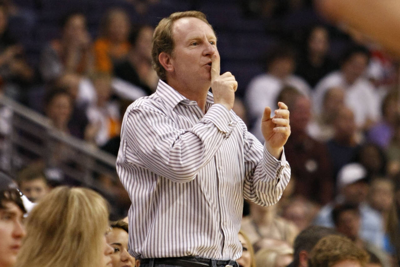 FILE - Phoenix Suns owner Robert Sarver gestures to Indiana Pacers' Danny Granger after Granger mis...