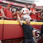 
              Amazon founder Jeff Bezos greets fans before the start of an NFL football game between the Kansas City Chiefs and the Los Angeles Chargers Thursday, Sept. 15, 2022, in Kansas City, Mo. (AP Photo/Ed Zurga)
            