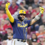 
              Milwaukee Brewers' Omar Narvaez reacts after hitting a single during the third inning of a baseball game against the Cincinnati Reds, Saturday, Sept. 24, 2022, in Cincinnati. (AP Photo/Jeff Dean)
            