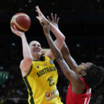 
              Canada's Kayla Alexander, right, attempts to block a shot by Australia's Lauren Jackson during their bronze medal game at the women's Basketball World Cup in Sydney, Australia, Saturday, Oct. 1, 2022. (AP Photo/Mark Baker)
            