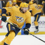 
              FILE - Nashville Predators' Yakov Trenin, of Russia, plays against the St. Louis Blues in the third period of an NHL hockey game Sunday, April 17, 2022, in Nashville, Tenn. The Czech Foreign Ministry told two NHL teams opening the season in Prague that any Russian players would not be welcome because of the war in Ukraine, prompting league officials to downplay the impact of the attempted ban. The Nashville Predators and San Jose Sharks are to play regular season games on Oct. 7 and 8 at Prague’s O2 Arena (AP Photo/Mark Humphrey, File)
            