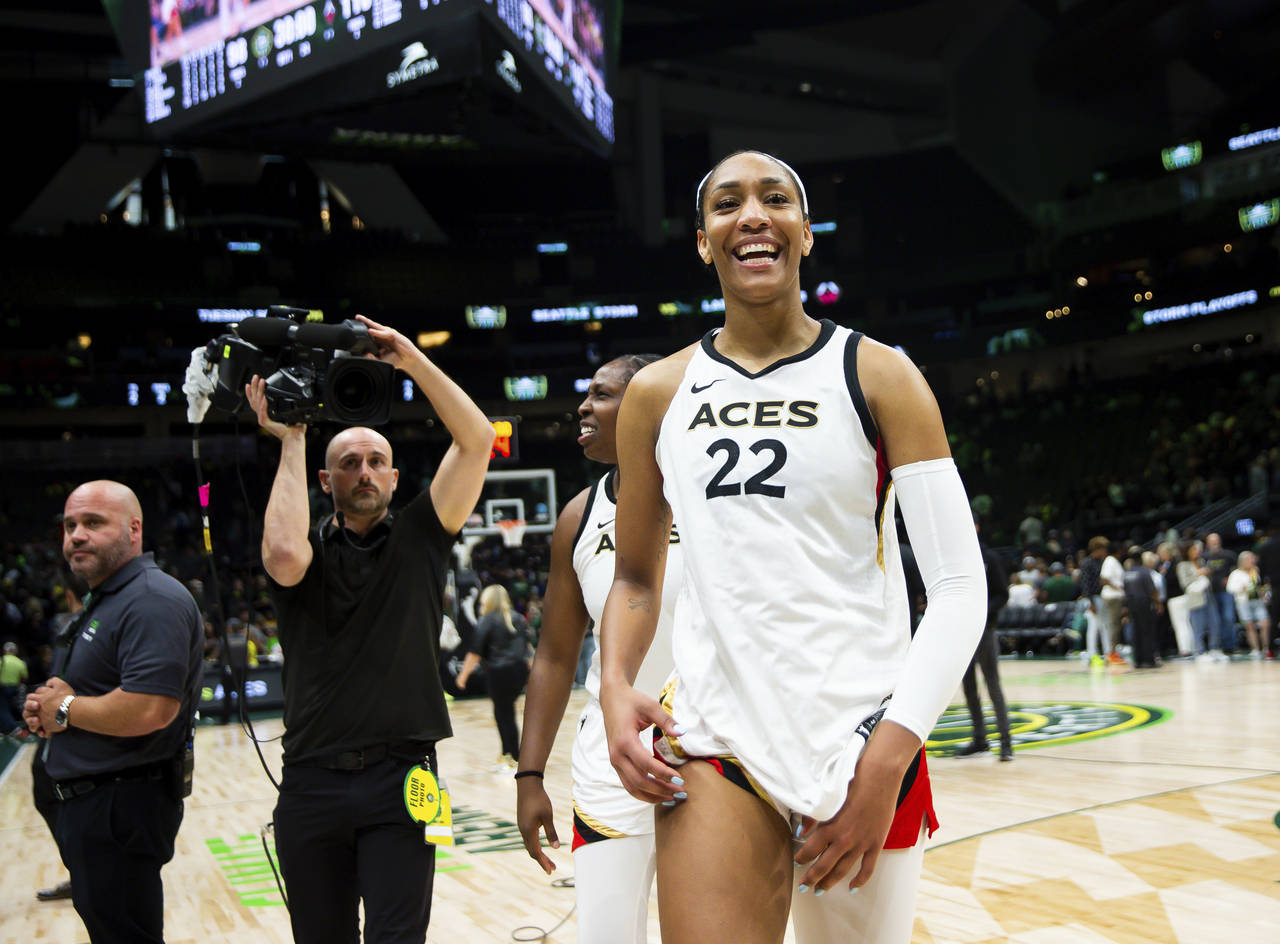 Las Vegas Aces forward A'ja Wilson (22) smiles while walking off the court after winning Game 3 of ...