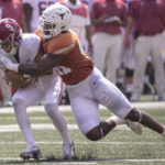 
              Alabama quarterback Bryce Young (9), is sacked by Texas linebacker Jaylan Ford (41) during the first half of an NCAA college football game, Saturday, Sept. 10, 2022, in Austin, Texas. (AP Photo/Rodolfo Gonzalez)
            