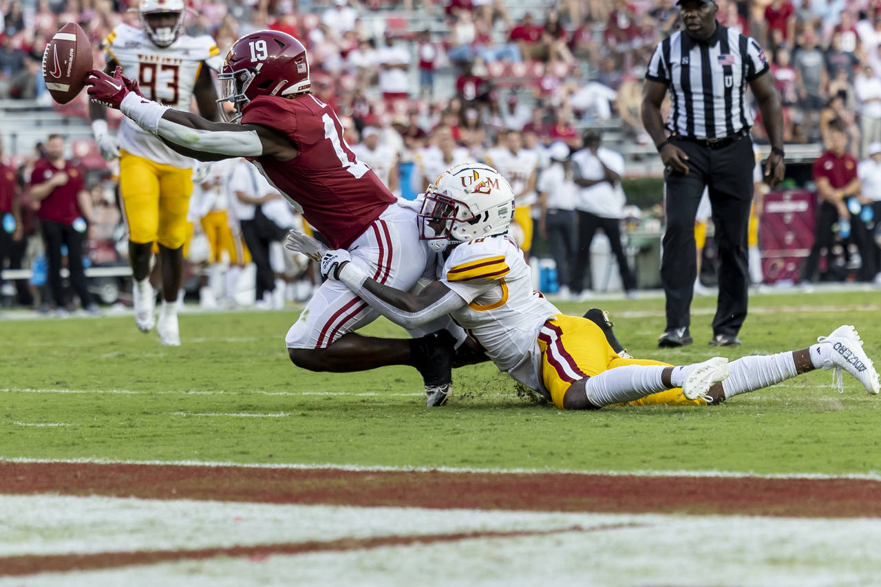 Alabama wide receiver Kendrick Law (19) just misses a catch with Louisiana-Monroe defensive back Ca...