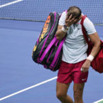 
              Rafael Nadal, of Spain, walks off the court after a loss to Frances Tiafoe, of the United States, during the fourth round of the U.S. Open tennis championships, Monday, Sept. 5, 2022, in New York. (AP Photo/Eduardo Munoz Alvarez)
            