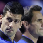 
              Team Europe's Novak Djokovic and Roger Federer line up on second day of the Laver Cup tennis tournament at the O2 in London, Saturday, Sept. 24, 2022. (AP Photo/Kin Cheung)
            