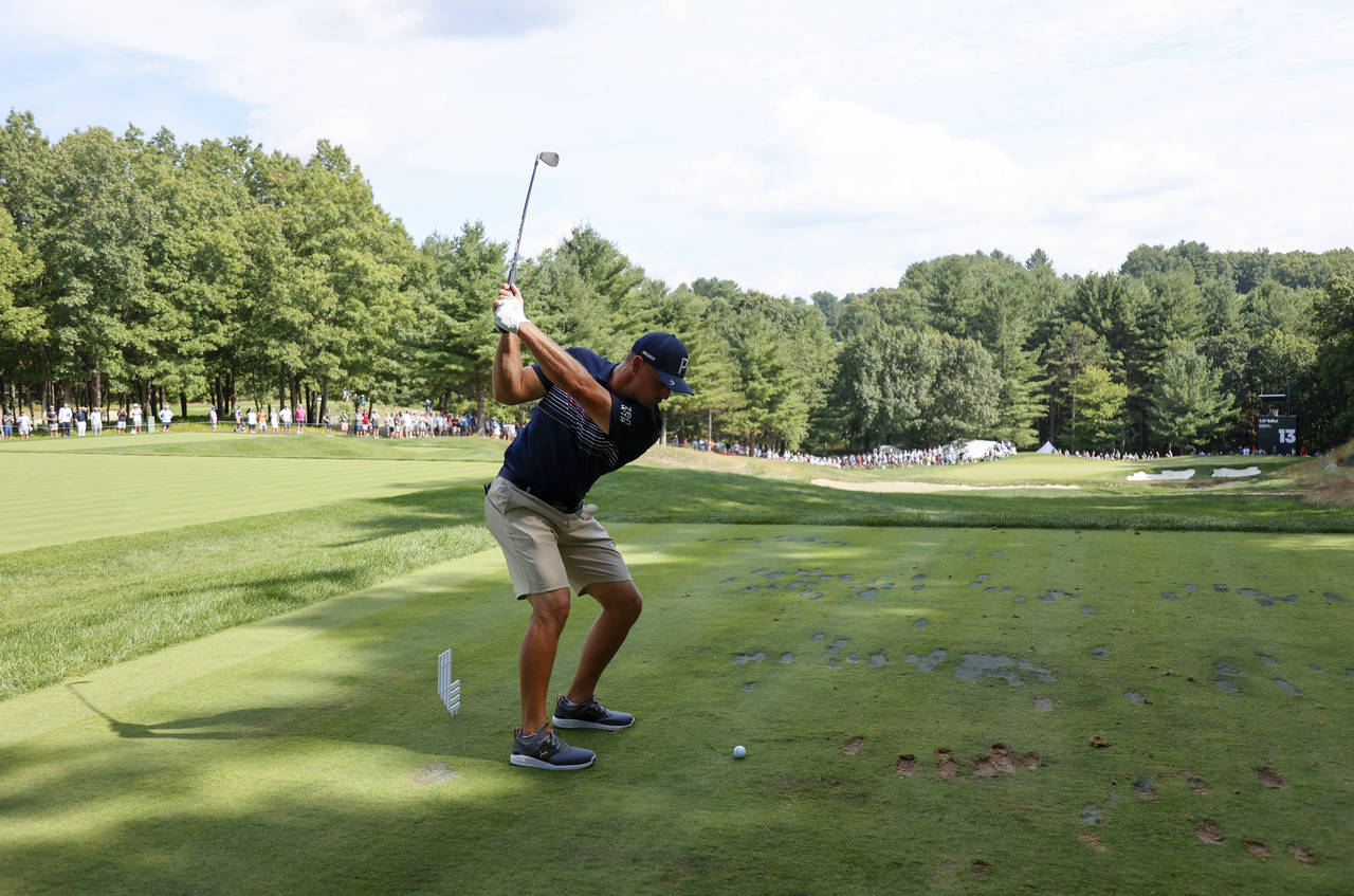 Bryson DeChambeau tees off on the 13th during the final round of the LIV Golf Invitational-Boston t...