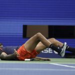 
              Nick Kyrgios, of Australia, takes a hard spill after returning a shot to Daniil Medvedev, of Russia, during the fourth round of the U.S. Open tennis championships, Sunday, Sept. 4, 2022, in New York. (AP Photo/Adam Hunger)
            