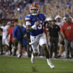 
              Florida quarterback Anthony Richardson (15) rushes for a 45-yard touchdown during the first half of an NCAA college football game against Utah, Saturday, Sept. 3, 2022, in Gainesville, Fla. (AP Photo/Phelan M. Ebenhack)
            