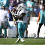 
              Miami Dolphins wide receiver Tyreek Hill (10) catches a pass for a touchdown during the second half of an NFL football game against the Baltimore Ravens, Sunday, Sept. 18, 2022, in Baltimore. (AP Photo/Nick Wass)
            