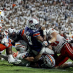 
              Auburn running back Jarquez Hunter (27) reaches the end zone for a touchdown against Mercer during the second half of an NCAA college football game Saturday, Sept. 3, 2022, in Auburn, Ala. (AP Photo/Butch Dill)
            