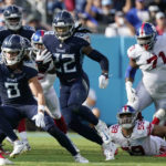 
              Tennessee Titans running back Derrick Henry (22) runs for a first down during the first half of an NFL football game against the New York Giants Sunday, Sept. 11, 2022, in Nashville. (AP Photo/Mark Humphrey)
            