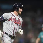 
              Atlanta Braves' Robbie Grossman runs the bases after hitting a solo home run against the Seattle Mariners during the sixth inning of a baseball game Friday, Sept. 9, 2022, in Seattle. (AP Photo/Caean Couto)
            