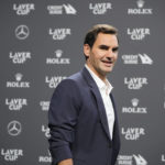 
              Switzerland's Roger Federer arrives for a media conference ahead of the Laver Cup tennis tournament at the O2 in London, Wednesday, Sept. 21, 2022. Federer will meet with the media Wednesday to discuss walking away from the game at age 41 after 20 Grand Slam titles. (AP Photo/Kin Cheung)
            