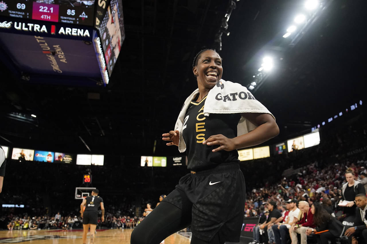Las Vegas Aces guard Chelsea Gray (12) celebrates as her team leads the Connecticut Sun during the ...