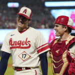 
              Los Angeles Angels starting pitcher Shohei Ohtani, left, talks with catcher Max Stassi after the eighth inning of a baseball game against the Oakland Athletics Thursday, Sept. 29, 2022, in Anaheim, Calif. (AP Photo/Mark J. Terrill)
            
