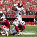 
              Oklahoma's Eric Gray (0) rushes against Nebraska's Garrett Nelson (44) during the first half of an NCAA college football game Saturday, Sept. 17, 2022, in Lincoln, Neb. (AP Photo/Rebecca S. Gratz)
            