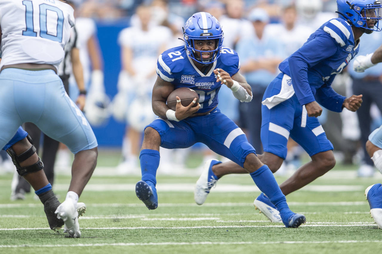 Georgia State running back Jamyest Williams carries the ball in the second half of an NCAA college ...