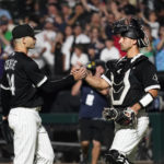 
              Chicago White Sox starting pitcher Dylan Cease, left, celebrates with catcher Seby Zavala after they defeated the Minnesota Twins in a baseball game in Chicago, Saturday, Sept. 3, 2022. (AP Photo/Nam Y. Huh)
            