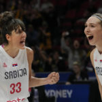 
              Serbia's Tina Krajisnik, left, and teammate Ivana Raca react after defeating France in their game at the women's Basketball World Cup in Sydney, Australia, Tuesday, Sept. 27, 2022. (AP Photo/Mark Baker)
            