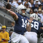 
              Penn State quarterback Sean Clifford (14) throws a pass against Ohio in the first half of an NCAA college football game, Saturday, Sept. 10, 2022, in State College, Pa. (AP Photo/Barry Reeger)
            