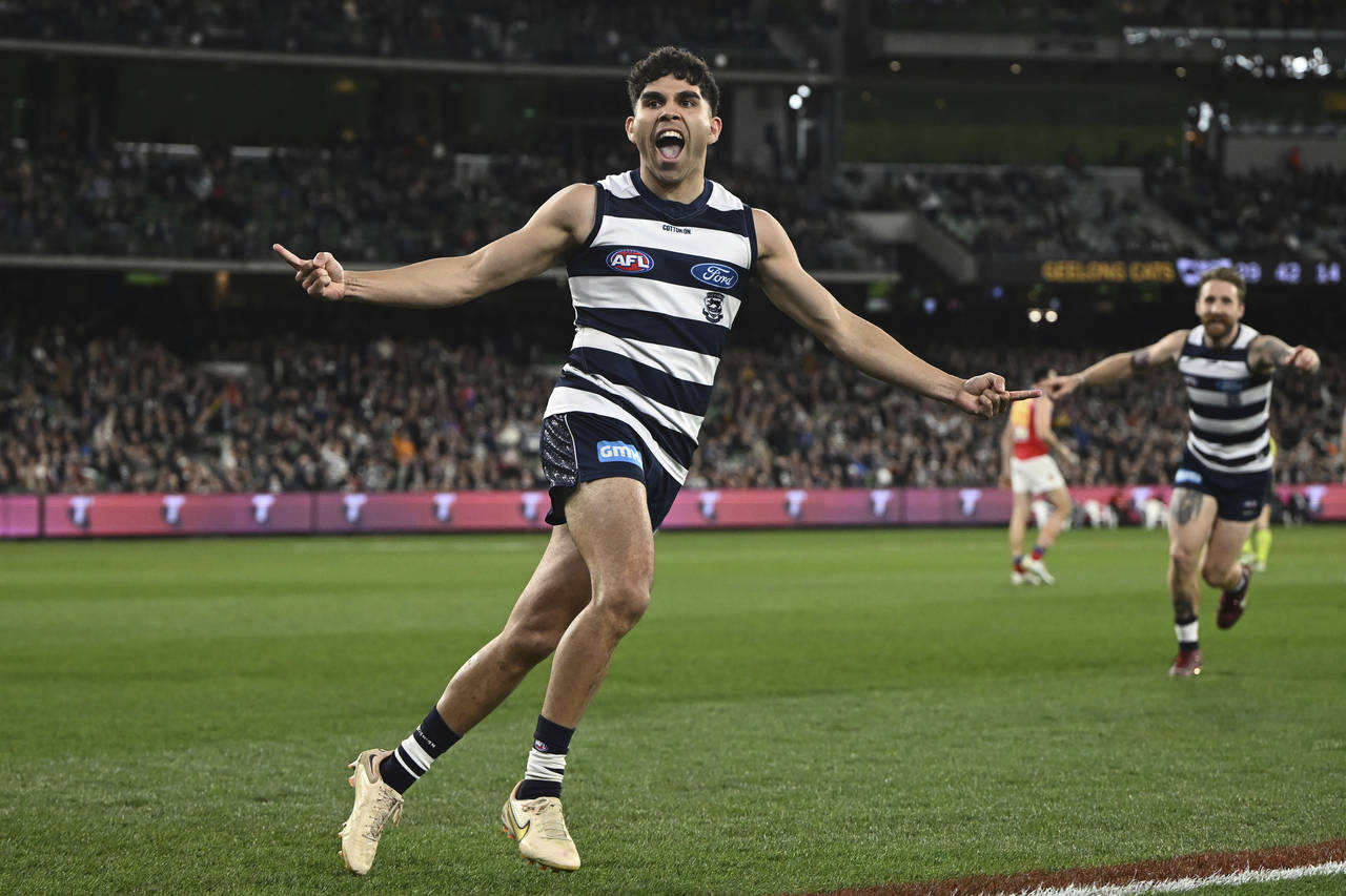 Tyson Stengle of Geelong celebrates kicking a goal during the AFL Preliminary Final match between t...