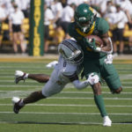 
              Baylor running back Craig Williams (0) runs against Texas State safety Jarron Morris (0 )during the first half of an NCAA college football game in Waco, Texas, Saturday, Sept. 17, 2022. (AP Photo/LM Otero)
            
