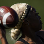 
              Sa'Mir Braccey, 17, throws a pass as she tries out for the Redondo Union High School girls flag football team on Thursday, Sept. 1, 2022, in Redondo Beach, Calif. Southern California high school sports officials will meet on Thursday, Sept. 29, to consider making girls flag football an official high school sport. This comes amid growth in the sport at the collegiate level and a push by the NFL to increase interest. (AP Photo/Ashley Landis)
            