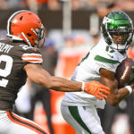 
              Cleveland Browns safety Grant Delpit (22) chases after New York Jets wide receiver Garrett Wilson after he made a catch and then took it in for a touchdown during the second half of an NFL football game, Sunday, Sept. 18, 2022, in Cleveland. The Jets won 31-30. (AP Photo/David Richard)
            