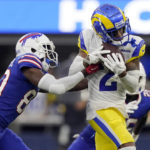 
              Los Angeles Rams cornerback Troy Hill (2) intercepts a pass intended for Buffalo Bills wide receiver Jamison Crowder during the first half of an NFL football game Thursday, Sept. 8, 2022, in Inglewood, Calif. (AP Photo/Mark J. Terrill)
            