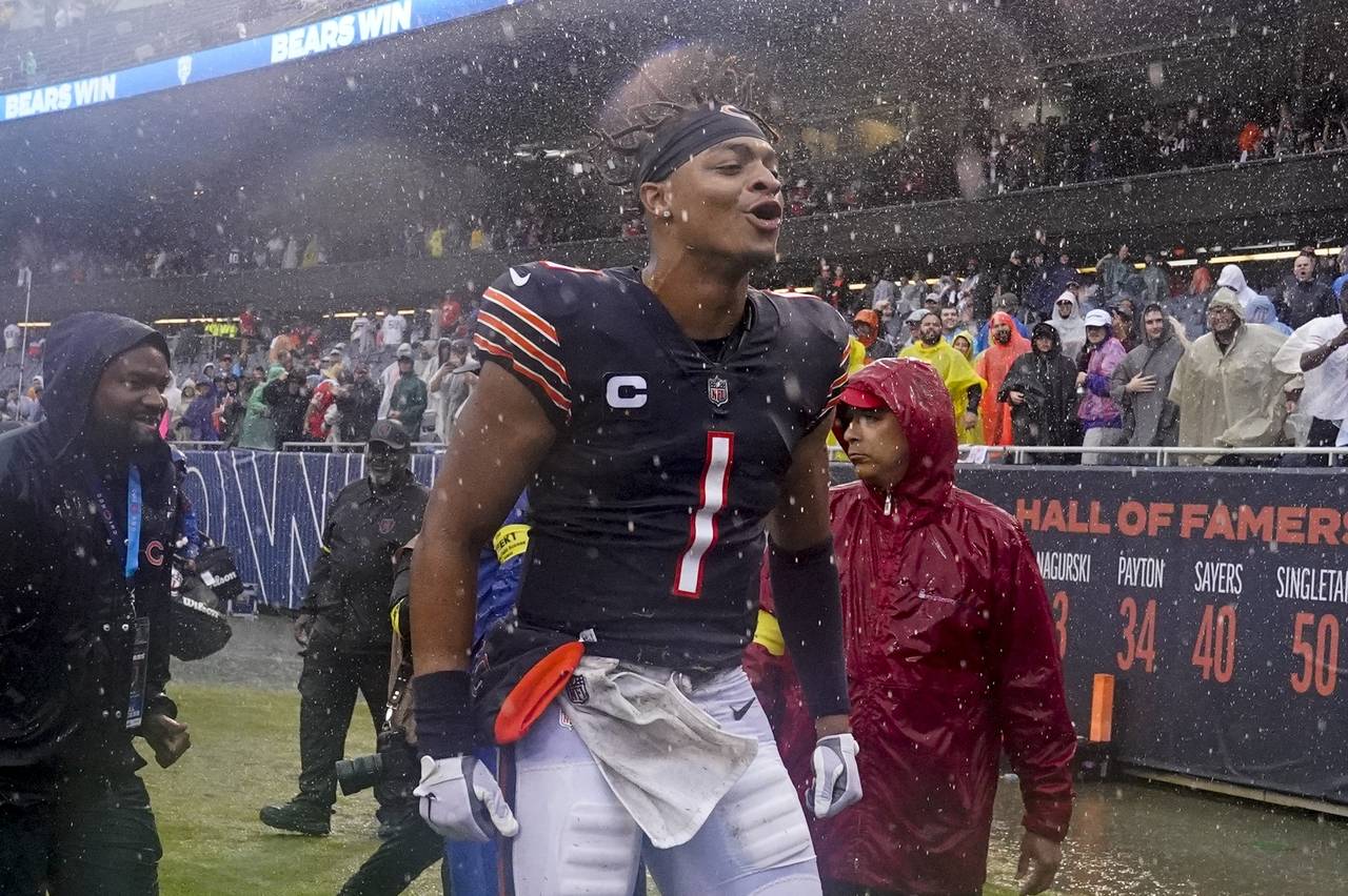 Chicago Bears' Justin Fields celebrates after an NFL football game against the San Francisco 49ers ...