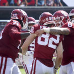 
              Oklahoma quarterback Dillon Gabriel (8) celebrates with wide receiver Gavin Freeman (82) after Freeman's touchdown during an NCAA college football game against UTEP on Saturday, Sept. 3, 2022, in Norman, Okla. (Ian Maule/Tulsa World via AP)
            