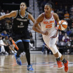 
              Connecticut Sun forward Alyssa Thomas drives to the basket as Chicago Sky forward Candace Parker defends during the second half of Game 4 of a WNBA basketball playoff semifinal Tuesday, Sept. 6, 2022, in Uncasville, Conn. (AP Photo/Jessica Hill)
            