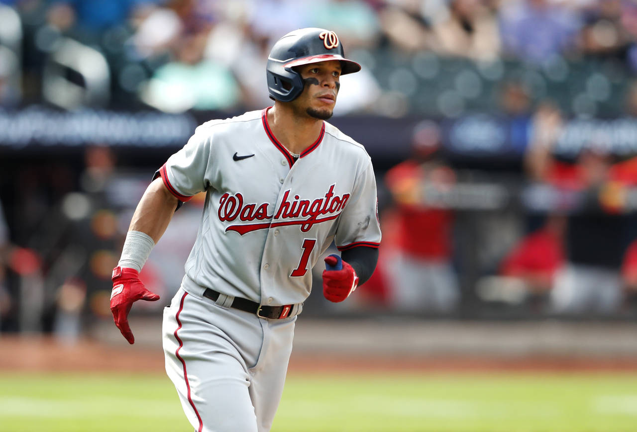 Washington Nationals' Cesar Hernandez rounds the bases after hitting a home run against the New Yor...