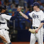 
              Tampa Bay Rays pitcher Pete Fairbanks, right, celebrates with catcher Christian Bethancourt after they defeated the Boston Red Sox in a baseball game Monday, Sept. 5, 2022, in St. Petersburg, Fla. (AP Photo/Scott Audette)
            