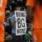 
              A person holds up a sign reminding fans of Phoenix Mercury's Brittney Griner during the first half of Game 2 in a WNBA basketball playoffs semifinal between the Chicago Sky and the Connecticut Sun on Wednesday, Aug. 31, 2022, in Chicago. (AP Photo/Nam Y. Huh)
            