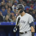 
              New York Yankees' Aaron Judge spits out his gum after striking out during sixth-inning baseball game action against the Toronto Blue Jays in Toronto, Monday, Sept. 26, 2022. (Nathan Denette/The Canadian Press via AP)
            