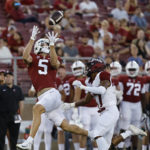
              Stanford wide receiver John Humphreys (5) catches a pass against Colgate defensive back Taitwoine Sanders (17) in the third quarter of an NCAA college football game in Stanford, Calif., Saturday, Sept. 3, 2022. (AP Photo/Josie Lepe)
            