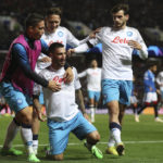
              Napoli's Matteo Politano, center, celebrates after scoring his side's opening goal from a penalty shot during the Champions League group A soccer match between Rangers and Napoli at the Ibrox stadium in Glasgow, Scotland, Wednesday, Sept. 14, 2022. (AP Photo/Scott Heppell)
            
