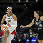 
              Las Vegas Aces forward A'ja Wilson (22) drives against Seattle Storm guard Sue Bird (10) during the first half in Game 3 of a WNBA basketball semifinal playoff series Sunday, Sept. 4, 2022, in Seattle. (AP Photo/Lindsey Wasson)
            