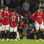 
              Manchester United's Cristiano Ronaldo and team mates stand dejected at full time after defeat during group E Europa League soccer match between Manchester United and Real Sociedad at Old Trafford in Manchester, England, Thursday, Sept. 8, 2022. (AP Photo/Dave Thompson)
            