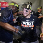 
              Houston Astros catcher Christian Vazquez, right, celebrates with manager Dusty Baker Jr. after the Astros clinched the American League West title with a win over the Tampa Bay Rays during a baseball game Monday, Sept. 19, 2022, in St. Petersburg, Fla. (AP Photo/Chris O'Meara)
            