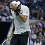 
              Matteo Berrettini, of Italy, reacts after losing a point to Casper Ruud, of Norway, during the quarterfinals of the U.S. Open tennis championships, Tuesday, Sept. 6, 2022, in New York. (AP Photo/Seth Wenig)
            