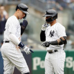 
              New York Yankees' Aaron Judge and Gleyber Torres celebrate after Torres's three run home run during the first inning a baseball game against the Tampa Bay Rays on Sunday, Sept. 11, 2022, in New York. (AP Photo/Noah K. Murray)
            
