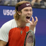 
              Andrey Rublev, of Russia, reacts during a quarterfinal match against Frances Tiafoe, of the United States, during the U.S. Open tennis championships, Wednesday, Sept. 7, 2022, in New York. (AP Photo/Mary Altaffer)
            
