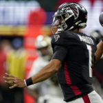 
              Atlanta Falcons quarterback Marcus Mariota (1) passes against the New Orleans Saints during the second half of an NFL football game, Sunday, Sept. 11, 2022, in Atlanta. (AP Photo/Brynn Anderson)
            