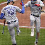 
              Toronto Blue Jays' Cavan Biggio, right, celebrates with Lourdes Gurriel Jr. (13) after hitting a solo home run against the Pittsburgh Pirates during the fourth inning of a baseball game, Sunday, Sept. 4, 2022, in Pittsburgh. (AP Photo/Keith Srakocic)
            