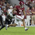 
              Alabama wide receiver Jermaine Burton (3) runs after a reception as Vanderbilt defensive back BJ Anderson (26) pursues during the first half of an NCAA college football game Saturday, Sept. 24, 2022, in Tuscaloosa, Ala. (AP Photo/Vasha Hunt)
            